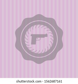 pistol icon inside pink emblem. Retro