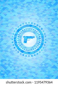 pistol icon inside realistic sky blue emblem. Mosaic background