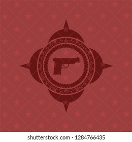 pistol icon inside red emblem