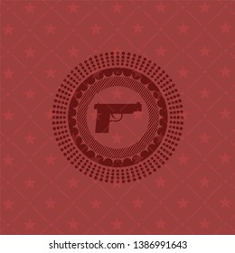 pistol icon inside red icon or emblem