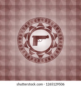 pistol icon inside red seamless badge with geometric pattern.