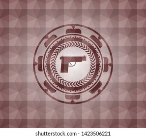 pistol icon inside red seamless geometric badge.