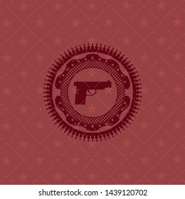 pistol icon inside retro style red emblem