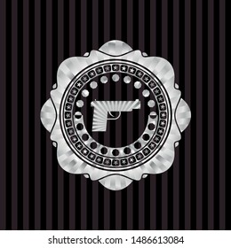 pistol icon inside silver shiny emblem