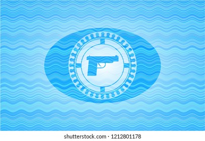 pistol icon inside water wave badge background.