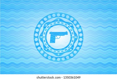 pistol icon inside water wave concept badge background.