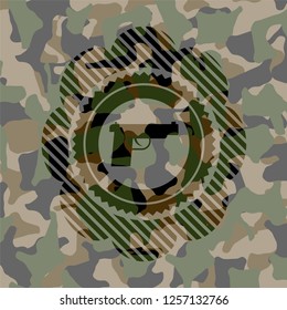 pistol icon on camo pattern