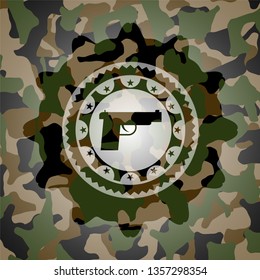 pistol icon on camo pattern