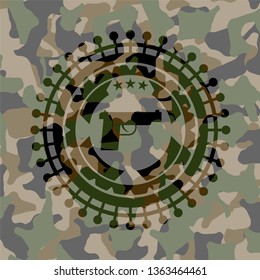 pistol icon on camouflage pattern