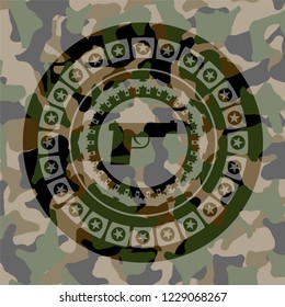 pistol icon on camouflage texture
