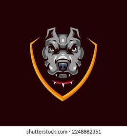 Pitbull Head in Shield Mascot Logo for Sport and Gaming isolated on dark Background