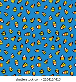 Pixel art candy corns on blue background. Sweet Halloween treats seamless pattern. Old school vintage retro 80's-90's 8 bit slot machine, video game graphics. 8 bit autumn holiday snack print.