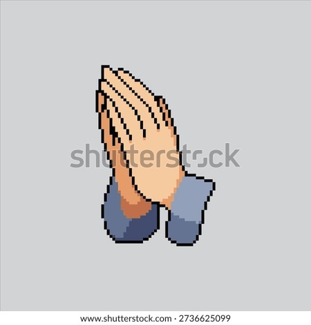 Pixel art illustration Praying hands. Pixelated Hands gesture. Praying hands gesture Icon pixelated for the pixel art game and icon for website and video game. old school retro.