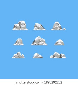 Pixel Art Set Of Stone With Snow Icon.