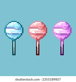 Pixel art sets of lollipop candy for with variation color items asset.blue,pink,and purple lollipop on pixelated style.8bits perfect for game asset or design asset element for your game design asset.