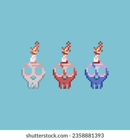 Pixel art sets of skull bones with candle with variation color items asset. bones fire on pixelated style.8bits perfect for game asset or design asset element for your game design asset.