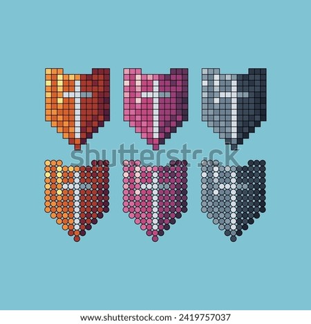 Pixel art stroke sets icon of shield variation color.Gold shield icon on pixelated style. 8bits perfect for game asset or design asset element for your game design. Simple pixel art icon asset.