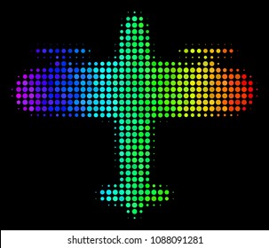 Pixel bright halftone aircraft icon drawn with spectrum color tints with horizontal gradient on a black background. Colorful vector pattern of aircraft illustration designed from circle dots.