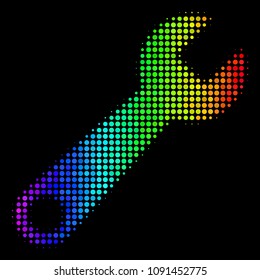 Pixel impressive halftone wrench icon drawn with spectrum color variations with horizontal gradient on a black background. Multicolored vector mosaic of wrench pictogram designed of round particles.