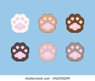 Pixel paws illustration icon set. Vector pixel art paws icons. 8 bit or 16 bit retro game style animal paws icon collection. Pixel cute cartoon cat or dog paws isolated icons on blue background.
