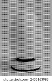 Pixelated greyscale image of a smiling egg design.