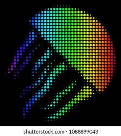Pixelated impressive halftone jellyfish icon using rainbow color tinges with horizontal gradient on a black background. Colorful vector concept of jellyfish illustration done from circle pixels.