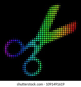 Pixelated impressive halftone scissors icon drawn with spectrum color hues with horizontal gradient on a black background. Bright vector pattern of scissors illustration formed with spheric items.