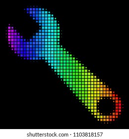 Pixelated impressive halftone wrench icon drawn with spectrum color tones with horizontal gradient on a black background. Color vector collage of wrench illustration composed of square elements.