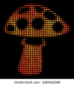 Pixelated mushroom icon. Bright pictogram in orange color variations on a black background. Vector halftone composition of mushroom icon organized with round pixels.
