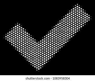 Pixelated white yes icon on a black background. Vector halftone mosaic of yes icon constructed from round elements.