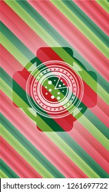 pizza icon inside christmas badge background.