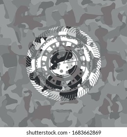 pizza icon inside grey camouflage emblem