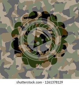 pizza slice icon inside camouflaged emblem