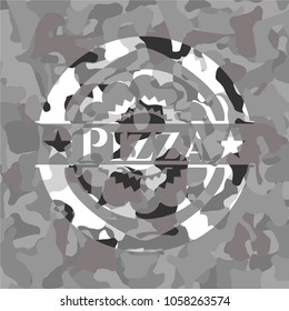 Pizza written on a grey camouflage texture