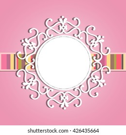 a place for an inscription or picture on  pink background. round frame with lace and striped ribbon on pink background