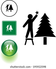 placing a star in a Christmas tree