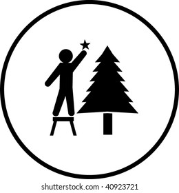 colocar una estrella en un árbol de navidad