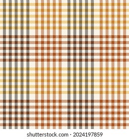 Plaid pattern for autumn winter in cognac brown, yellow, beige. Seamless herringbone tartan check graphic background vector for scarf, dress, blanket, throw, other modern tweed fashion fabric print.