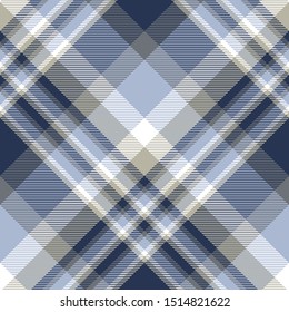 Plaid pattern in blue, navy, taupe and white.