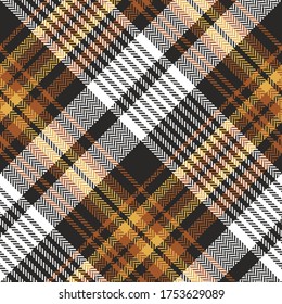 Plaid pattern in brown, yellow, white for autumn fabric design. Seamless tartan check plaid for skirt, flannel shirt, or other textile prints. Herringbone diagonal texture.