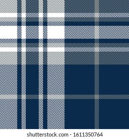 Plaid pattern. Herringbone seamless woven tartan check plaid background in navy blue, grey, and white for flannel shirt, blanket, throw, duvet cover, or other modern fashion textile design.