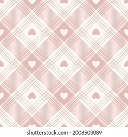 Plaid pattern in pink and white with hearts for Valentine's Day. Seamless buffalo check tartan check for flannel shirt, tablecloth, picnic blanket, other modern spring summer fashion fabric design.