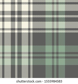 Plaid pattern seamless vector texture. Herringbone tartan check plaid background in grey, soft green, and off white for flannel shirt, blanket, throw, duvet cover, or other winter textile design.