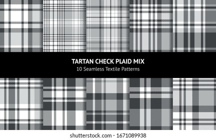 Plaid pattern set in white and grey. Seamless tartan check plaids for flannel shirt, blanket, throw, or other autumn winter fabric design.