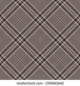 Plaid pattern tweed in brown and beige. Tartan seamless textured spring, autumn, winter check plaid for flannel shirt, skirt, jacket, dress, trousers, or other modern glen fashion textile print.