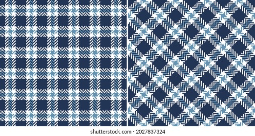 Plaid pattern tweed in navy blue and white for dress, jacket, coat, skirt, scarf. Seamless modern herringbone textured dark small tartan check for spring autumn winter fashion fabric print.