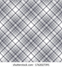 Plaid pattern vector in grey and white. Herringbone seamless textured check plaid graphic for skirt, jacket, coat, or other modern autumn winter textile print.