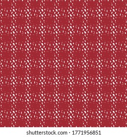 Plaid textile pattern in red and white. Abstract knit texture. Wool or cotton jersey.