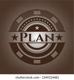 Plan badge with wood background