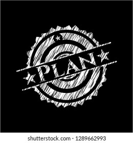 Plan written on a chalkboard